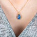 Tanzanite teardrop necklace on model