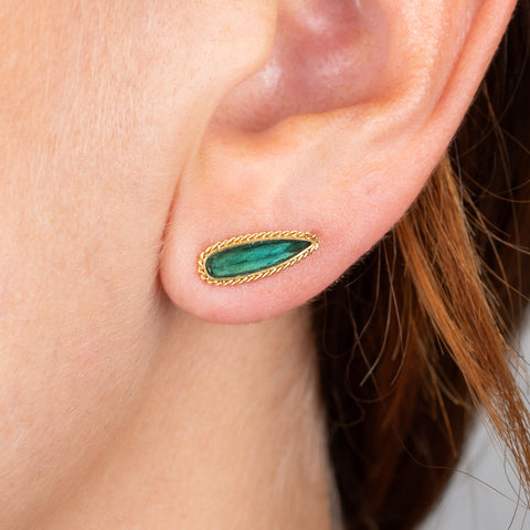 Tourmaline and gold stud earrings on model