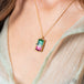Rectangular watermelon tourmaline necklace on a model side view.