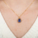 Tanzanite teardrop necklace on model