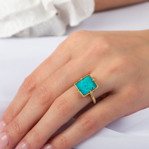 Turquoise portrait ring on model