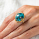 Turquoise and gold ring side view