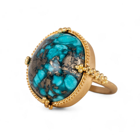 Turquoise and gold ring side view