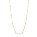 Close up of 18k gold whisper chain necklace with Pearl