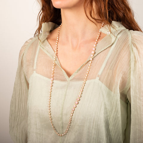 Woven pink opal necklace on model