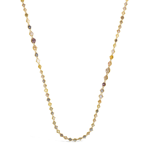 This long 18k yellow gold necklace features multi-colored diamonds woven throughout with delicate chain. The diamonds are graduated in size throughout.