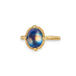 Moonstone ring in 18K yellow gold, with colors swirling akin to the Milky Way. Yellow and gold streaks through deep, navy blue. Set in a meticulously handmade gold frame with braided gold and granulated prongs. 