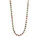This woven 18k yellow gold necklace features pink and green tourmaline gemstone beads throughout a delicate chain