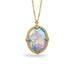 Ethiopian Opal pendant in 18K yellow gold, showcasing delicate iridescence. Rainbow colors from electric green to peacock blue and neon-pink confetti flicker across its surface. Set in a handmade gold frame with braided gold accents and granulated prongs
