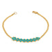This delicate 18k yellow gold chain bracelet features three rows of woven turquoise beads in the center. The bracelet is finished with a lobster clasp closure.