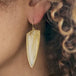 rutilated quartz and 18k gold earrings on model