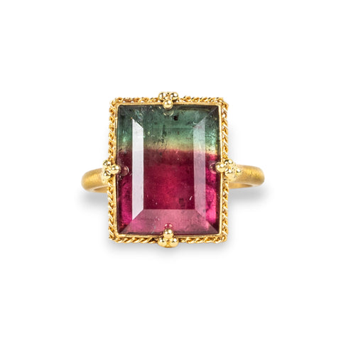 18K yellow gold Tourmaline ring with color variation. Green and raspberry pink hues resemble watermelon. Set in 18K gold with handmade prongs.
