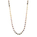 A woven 18k yellow gold necklace features ombre shaded faceted amethyst beads throughout 