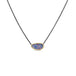 An elongated Australian opal with blue, pink and purple hues, is set in a handmade 18k yellow gold bezel on an oxidized sterling silver chain.