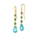 This pair of 18k yellow gold drop earrings feature three woven emeralds and a teardrop shaped blue apatite stone at the bottom. The earrings are finished with a French hook closure.