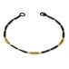 This oxidized sterling silver chain bracelet has three champagne diamond and 18k yellow gold bars stationed throughout.