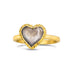 A heart shaped champagne colored diamond is set in an 18k yellow gold chain wrapped bezel. The ring is set on a thin band.