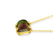 This rectangular pink and green watermelon tourmaline necklace is set in an 18k yellow gold chain wrapped bezel with four beaded prongs. The stone is suspended on a delicate chain.
