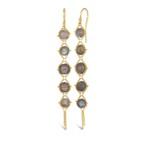 A pair of long 18k yellow gold earrings are crafted with graduated iridescent labradorite stones suspended in delicate chain. The earrings are fastened with French hook closures.