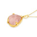 This teardrop shaped pink morganite stone is set in an 18k yellow gold chain wrapped bezel with four beaded prongs. The pendant hangs on a short delicate chain.
