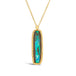 An elongated opalized wood stone is set in an 18k yellow gold chain wrapped bezel. The pendant hangs from a short delicate chain.