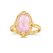 A pale pink oval morganite stone ring is set in an 18k yellow gold chain wrapped bezel with four beaded prongs. The stone sits on a thin band.