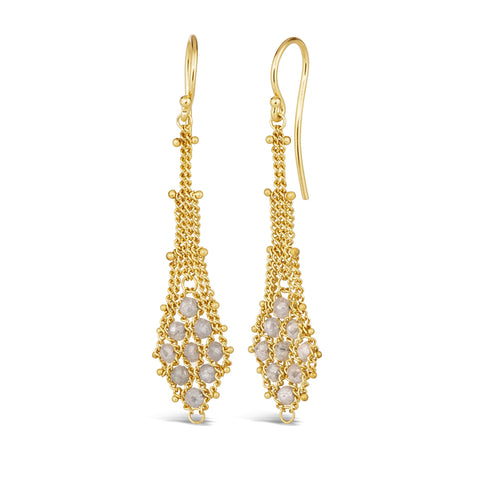 A pair of 18k yellow gold earrings is crafted with silver diamonds woven into a diamond lattice pattern with delicate chain that is suspended from a french hook closure.
