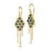 Small blue diamonds are woven with 18k yellow gold chain in a diamond lattice pattern and have three dangling chains. The earrings are fastened with french hook closures.